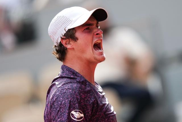 Brazil's Joao Fonseca reacts as he plays against Serbia's Novak Djokovic during their men's singles match on day 6 of the French Open tennis tournament on Court Philippe-Chatrier at the Roland-Garros Complex in Paris on May 29, 2026. (Photo by Dimitar DILKOFF / AFP)