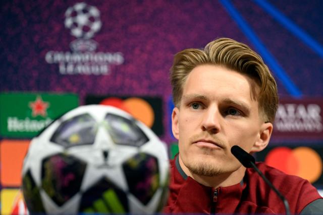 Arsenal's Norwegian midfielder #08 Martin Odegaard addresses a MD-1 press conference on May 29, 2026, the eve of the UEFA Champions League final football match between Paris Saint-Germain (PSG) and Arsenal at the Puskas Arena in Budapest. Paris Saint-Germain (PSG) face Arsenal in the UEFA Champions League final football match on May 30, 2026 in Budapest. (Photo by INA FASSBENDER / POOL / AFP)