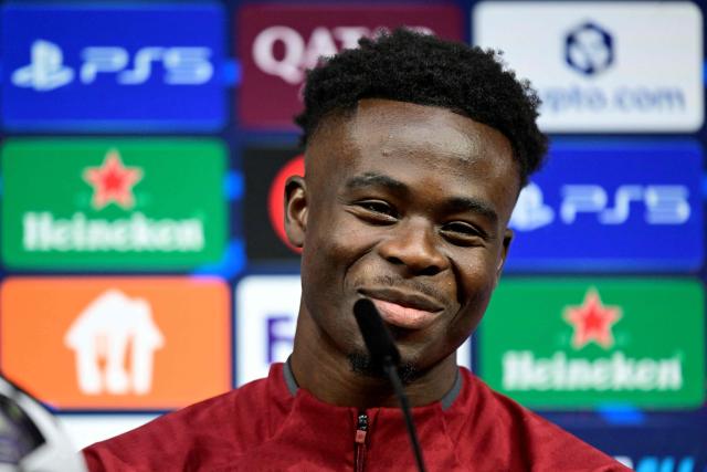 Arsenal's English midfielder #07 Bukayo Saka addresses a MD-1 press conference on May 29, 2026, the eve of the UEFA Champions League final football match between Paris Saint-Germain (PSG) and Arsenal at the Puskas Arena in Budapest. Paris Saint-Germain (PSG) face Arsenal in the UEFA Champions League final football match on May 30, 2026 in Budapest. (Photo by INA FASSBENDER / POOL / AFP)