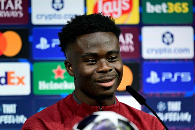 Arsenal's English midfielder #07 Bukayo Saka addresses a MD-1 press conference on May 29, 2026, the eve of the UEFA Champions League final football match between Paris Saint-Germain (PSG) and Arsenal at the Puskas Arena in Budapest. Paris Saint-Germain (PSG) face Arsenal in the UEFA Champions League final football match on May 30, 2026 in Budapest. (Photo by INA FASSBENDER / POOL / AFP)