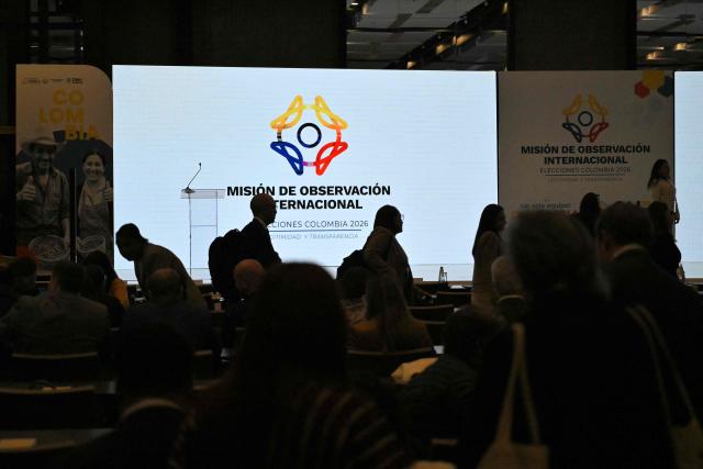 Guests attend the presentation of the International Observation Mission for Colombia's May 31 presidential election in Bogota on May 29, 2026. (Photo by Rodrigo BUENDIA / AFP)