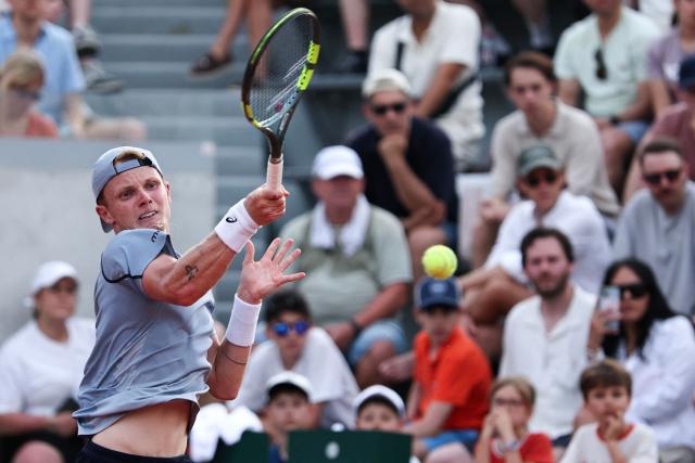 Netherlands' Jesper de Jong plays a forehand return to Karen Khachanov during their men's singles match on day 6 of the French Open tennis tournament at the Roland-Garros Complex in Paris on May 29, 2026. (Photo by Anne-Christine POUJOULAT / AFP)