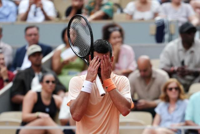 Serbia's Novak Djokovic reacts after a point as he plays against Brazil's Joao Fonseca during their men's singles match on day 6 of the French Open tennis tournament on Court Philippe-Chatrier at the Roland-Garros Complex in Paris on May 29, 2026. (Photo by Dimitar DILKOFF / AFP)