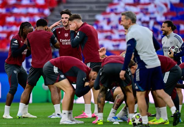 Arsenal's players warm up during a MD-1 training session at the Puskas Arena in Budapest on May 29, 2026, on the eve of the UEFA Champions League final football match between Paris Saint-Germain (PSG) and Arsenal FC. Paris Saint-Germain (PSG) face Arsenal in the UEFA Champions League final football match on May 30, 2026 in Budapest. (Photo by INA FASSBENDER / AFP)