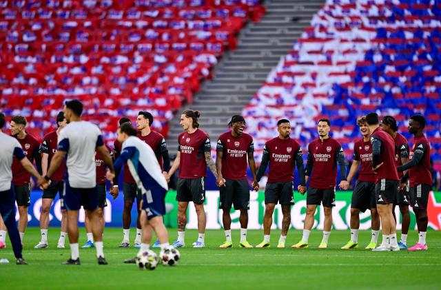 Arsenal's players react during a MD-1 training session at the Puskas Arena in Budapest on May 29, 2026, on the eve of the UEFA Champions League final football match between Paris Saint-Germain (PSG) and Arsenal FC. Paris Saint-Germain (PSG) face Arsenal in the UEFA Champions League final football match on May 30, 2026 in Budapest. (Photo by INA FASSBENDER / AFP)