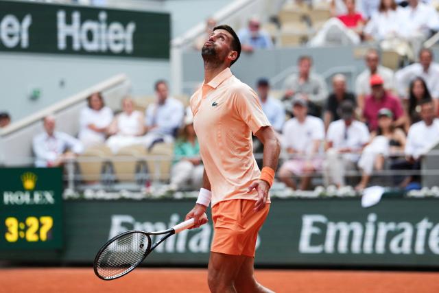 Serbia's Novak Djokovic reacts as he plays against Brazil's Joao Fonseca during their men's singles match on day 6 of the French Open tennis tournament on Court Philippe-Chatrier at the Roland-Garros Complex in Paris on May 29, 2026. (Photo by Dimitar DILKOFF / AFP)