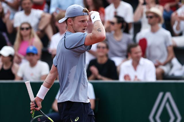 Netherlands' Jesper de Jong reacts after a point as he plays against Karen Khachanov during their men's singles match on day 6 of the French Open tennis tournament at the Roland-Garros Complex in Paris on May 29, 2026. (Photo by Anne-Christine POUJOULAT / AFP)