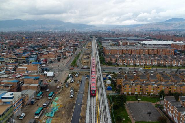 An aerial view shows initial test runs with passengers on the first line of the Bogota Metro in Bogota on May 29, 2026. (Photo by Sergio Acero / AFP)
