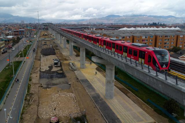 An aerial view shows initial test runs with passengers on the first line of the Bogota Metro in Bogota on May 29, 2026. (Photo by Sergio Acero / AFP)