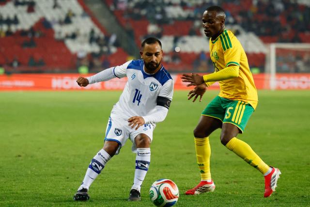 South Africa's defender #25 Kamogelo Sebelebele fights for the ball with Nicaragua's forward #06 Jason Eliezer during the international friendly football match between South Africa and Nicaragua at Orlando Stadium in Soweto on May 29, 2026. (Photo by Phill Magakoe / AFP)