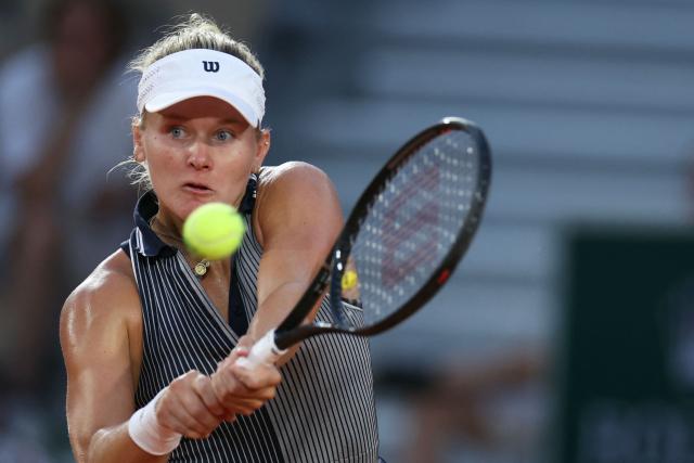 US Peyton Stearns plays a backhand return to Switzerland's Belinda Bencic during their women's singles match on day 6 of the French Open tennis tournament on Court Simonne-Mathieu at the Roland-Garros Complex in Paris on May 29, 2026. (Photo by Alain JOCARD / AFP)