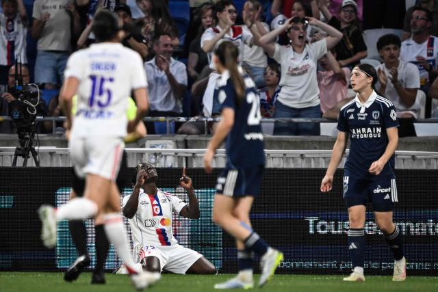 Lyon’s Malawian forward #22 Tabitha Chawinga (C) celebrates after scoring a goal during the French women L1 football final match between OL Lyonnes and Paris FC at the Groupama stadium in Decines-Charpieu, central-eastern France, on May 29, 2026. (Photo by JEFF PACHOUD / AFP)