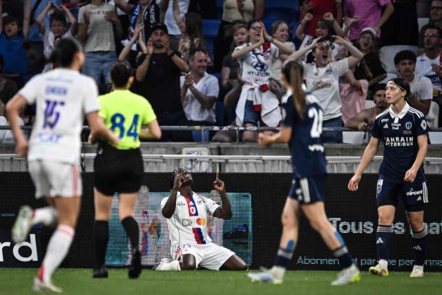 Lyon’s Malawian forward #22 Tabitha Chawinga (C) celebrates after scoring a goal during the French women L1 football final match between OL Lyonnes and Paris FC at the Groupama stadium in Decines-Charpieu, central-eastern France, on May 29, 2026. (Photo by JEFF PACHOUD / AFP)