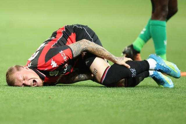 Nice's French defender #26 Melvin Bard reacts as he lays down on the pitch during the L1-L2 playoff second-leg football match between first divison club OGC Nice and second division club AS Saint-Etienne at the Allianz Riviera Stadium in Nice, south-eastern France, on May 29, 2026. (Photo by Valery HACHE / AFP)