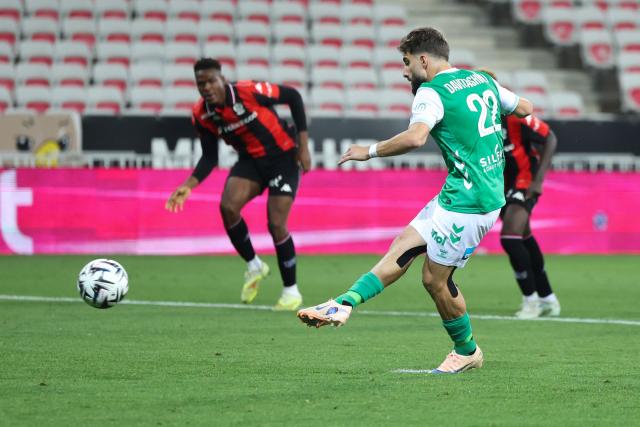 Saint-Etienne's Georgian midfielder #22 Zuriko Davitashvili scores a penalty during the L1-L2 playoff second-leg football match between first divison club OGC Nice and second division club AS Saint-Etienne at the Allianz Riviera Stadium in Nice, south-eastern France, on May 29, 2026. (Photo by Valery HACHE / AFP)