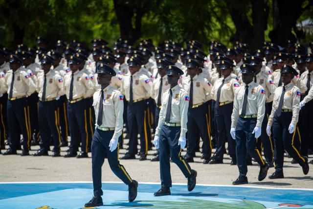 New members of Haiti's National Police stand in formation during their graduation ceremony at the Police Academy in Port-au-Prince, Haiti, on May 29, 2026. (Photo by Clarens SIFFROY / AFP)