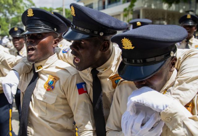 New members of Haiti's National Police celebrate at the end of their graduation ceremony at the Police Academy in Port-au-Prince, Haiti, on May 29, 2026. (Photo by Clarens SIFFROY / AFP)