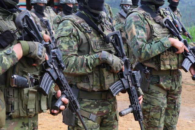 Members of the Army take part in an operation against illegal mining in Buenos Aires, Imbabura province, Ecuador, on May 27, 2026. In Ecuador's rugged La Merced area, soldiers face substantial challenges from illegal gold miners and armed groups, including the Colombian Oliver Sinisterra Front and the Ecuadorian gang Los Lobos. Despite military operations supported by the U.S. to combat mining-related violence, the illegal mining sector continues to thrive, generating over $1.6 billion annually, surpassing drug trafficking revenues in some regions. Recent military efforts include air support and demolitions targeting illegal operations, as the country grapples with high homicide rates and ongoing criminal conflicts fueled by lucrative gold prices. (Photo by Galo Paguay / AFP)