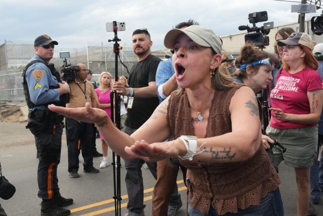 Protesters confront NJ State police at the federal immigration center at Delaney Hall, which is being used as an Immigration and Customs Enforcement (ICE) detention center, in Newark, New Jersey, on May 29, 2026. Protesters clashed with US law enforcement outside an immigration detention center in New Jersey, a top US official said Friday, after inmates inside staged a hunger strike over conditions. Days of unrest outside the ICE detention center have led to several arrests as a tough stance by US President Donald Trump's administration draws stiff opposition. (Photo by Bryan R. SMITH / AFP)