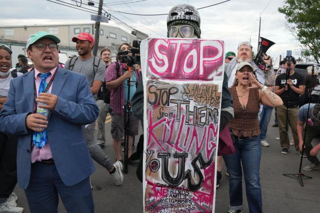 Protesters confront NJ State police at the federal immigration center at Delaney Hall, which is being used as an Immigration and Customs Enforcement (ICE) detention center, in Newark, New Jersey, on May 29, 2026. Protesters clashed with US law enforcement outside an immigration detention center in New Jersey, a top US official said Friday, after inmates inside staged a hunger strike over conditions. Days of unrest outside the ICE detention center have led to several arrests as a tough stance by US President Donald Trump's administration draws stiff opposition. (Photo by Bryan R. SMITH / AFP)