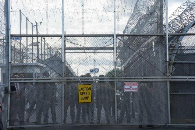 Immigration and Customs Enforcement (ICE) agents stand guard outside Delaney Hall, which is being used as an Immigration and Customs Enforcement (ICE) detention center, in Newark, New Jersey, on May 29, 2026. Protesters clashed with US law enforcement outside an immigration detention center in New Jersey, a top US official said Friday, after inmates inside staged a hunger strike over conditions. Days of unrest outside the ICE detention center have led to several arrests as a tough stance by US President Donald Trump's administration draws stiff opposition. (Photo by Bryan R. SMITH / AFP)