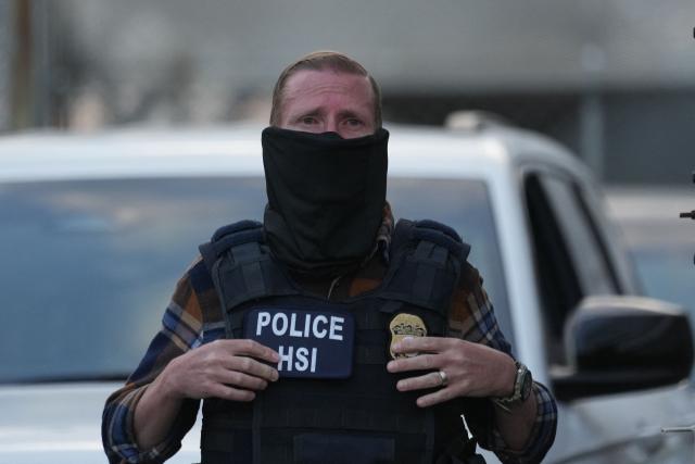 A member of Homeland Security stands outside the federal immigration center at Delaney Hall, which is being used as an Immigration and Customs Enforcement (ICE) detention center, in Newark, New Jersey, on May 29, 2026. According to US media reports, demonstrators clashed with federal agents over the holiday weekend over alledged poor living conditions inside the detention facility. (Photo by Bryan R. SMITH / AFP)