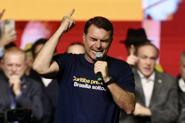 Brazilian senator and presidential hopeful Flavio Bolsonaro speaks during a rally to launch Sergio Moro's candidature for governor of Parana in Curitiba, Parana state, Brazil on May 29, 2026. (Photo by Albari Rosa / AFP)