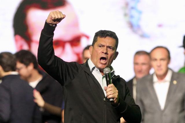 Brazilian senator Sergio Moro (R) speaks during a rally to launch his candidature for governor of Parana in Curitiba, Parana state, Brazil on May 29, 2026. (Photo by Albari Rosa / AFP)