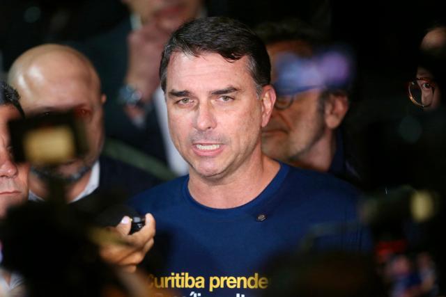 Brazilian senator and presidential hopeful Flavio Bolsonaro speaks to the press during a rally to launch Sergio Moro's candidature for governor of Parana in Curitiba, Parana state, Brazil on May 29, 2026. (Photo by Albari Rosa / AFP)