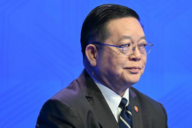 Association of Southeast Asian Nations (ASEAN) Secretary General Kao Kim Hourn attends a plenary session of the 23rd Shangri-La Dialogue summit in Singapore on May 30, 2026. (Photo by JAM STA ROSA / AFP)