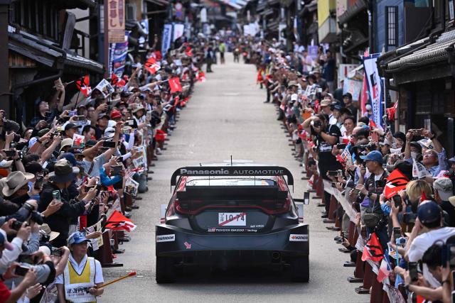 Sami Pajari of Finland and his co-driver Marko Salminen of Finland drive their Toyota GR Yaris Rally1 on the traditional Japanese townscape of Iwamura during the Rally Japan, the 7th round of the FIA World Rally Championships in Ena city, Gifu prefecture on May 30, 2026. (Photo by Toshifumi KITAMURA / AFP)