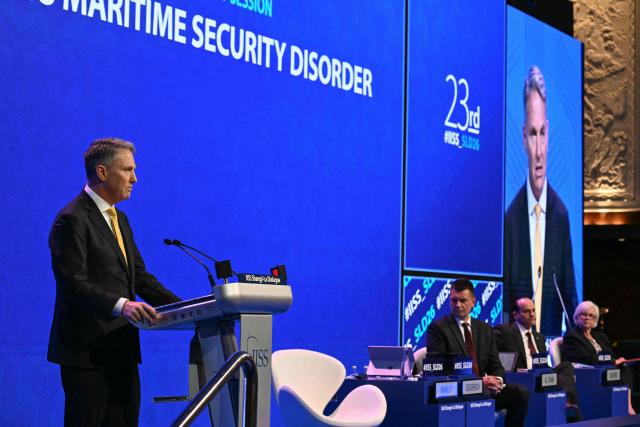 Australia's Deputy Prime Minister and Defence Minister Richard Marles (L) speaks during a plenary session of the 23rd Shangri-La Dialogue summit in Singapore on May 30, 2026. (Photo by JAM STA ROSA / AFP)