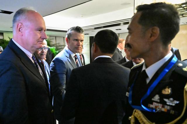 US Secretary of Defence Pete Hegseth (C) arrives for a ministerial roundtable during the 23rd Shangri-La Dialogue summit in Singapore on May 30, 2026. (Photo by MOHD RASFAN / AFP)