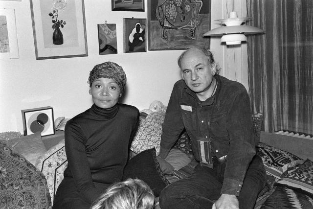 (FILES) French philosopher and sociologist Edgar Morin poses with his wife, Canadian actress, model and writer Johanne Harrelle on December 16, 1975 at his home in Paris. The French sociologist and philosopher Edgar Morin, a major figure in France's intellectual life, died on May 29, 2026, at the age of 104, AFP learned from his wife on May 30, 2026. (Photo by Georges PAVUNIC / AFP)