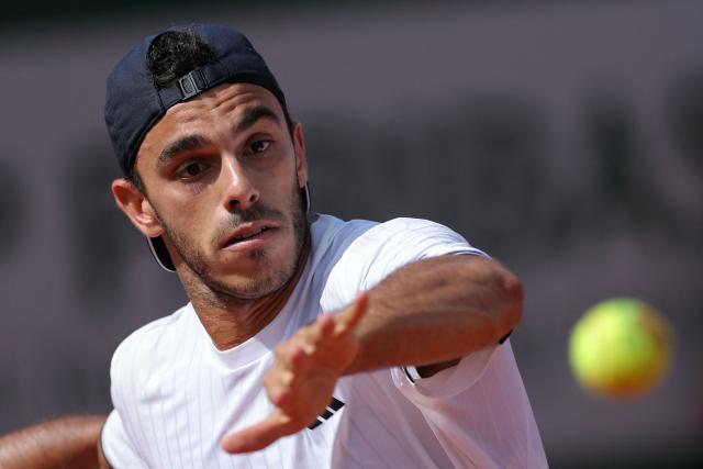 Argentina's Francisco Cerundolo eyes the ball as he plays a forehand return to US Zachary Svajda during their men's singles match on day 7 of the French Open tennis tournament at the Roland-Garros Complex in Paris on May 30, 2026. (Photo by Thomas SAMSON / AFP)