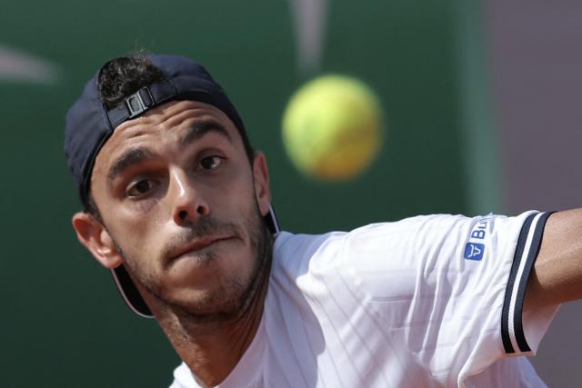 Argentina's Francisco Cerundolo eyes the ball as he plays a forehand return to US Zachary Svajda during their men's singles match on day 7 of the French Open tennis tournament at the Roland-Garros Complex in Paris on May 30, 2026. (Photo by Thomas SAMSON / AFP)