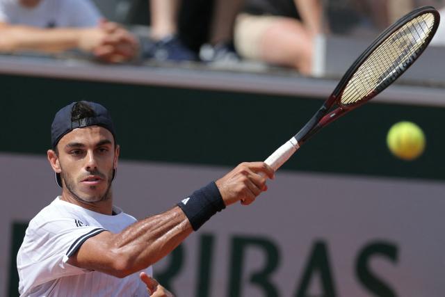 Argentina's Francisco Cerundolo plays a forehand return to US Zachary Svajda during their men's singles match on day 7 of the French Open tennis tournament at the Roland-Garros Complex in Paris on May 30, 2026. (Photo by Thomas SAMSON / AFP)