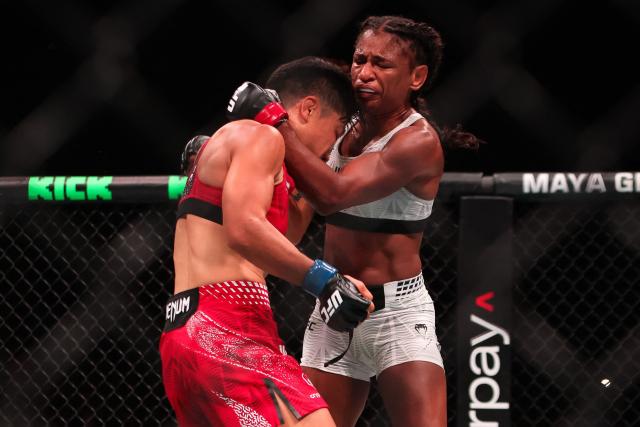 US strawweight fighter Angela Hill (R) fights with China’s Xiong Jingnan during their bout at UFC Fight Night at the Galaxy hotel resort in Macau on May 30, 2026. (Photo by Eduardo Leal / AFP)