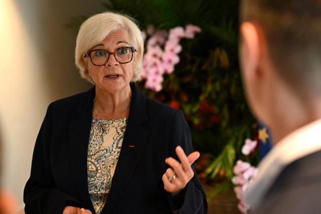 France's Minister for the Armed Forces and Veterans Catherine Vautrin gestures during an interview with AFP at the 23rd Shangri-La Dialogue summit in Singapore on May 30, 2026. (Photo by JAM STA ROSA / AFP)