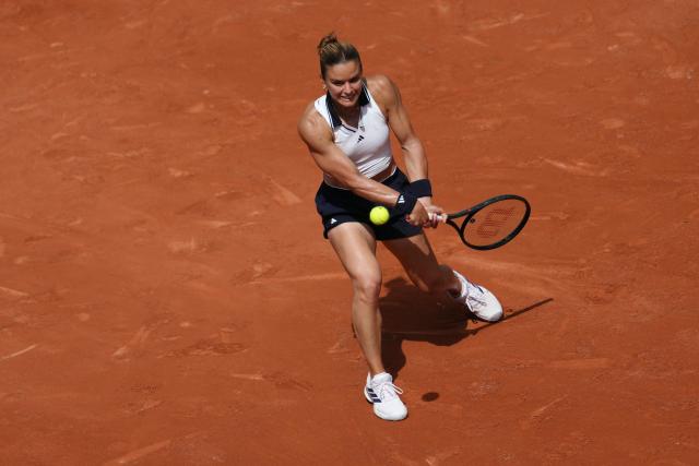 Greece's Maria Sakkari plays a backhand return to Poland's Maja Chwalinska during their women's singles match on day 7 of the French Open tennis tournament on Court Simonne-Mathieu at the Roland-Garros Complex in Paris on May 30, 2026. (Photo by Dimitar DILKOFF / AFP)