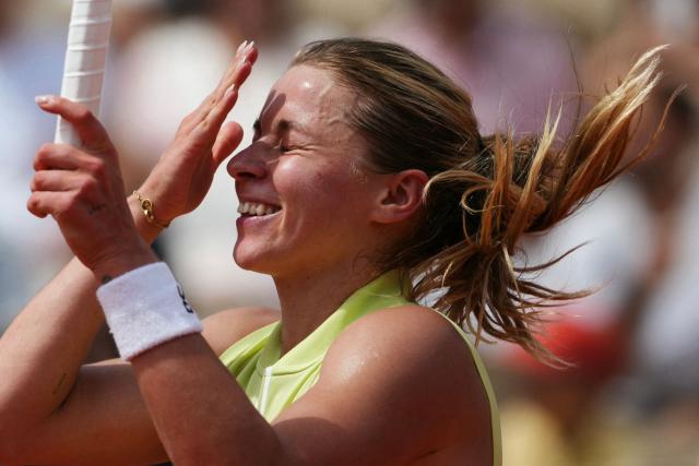 Poland's Maja Chwalinska celebrates her victory over Greece's Maria Sakkari during their women's singles match on day 7 of the French Open tennis tournament on Court Simonne-Mathieu at the Roland-Garros Complex in Paris on May 30, 2026. (Photo by Dimitar DILKOFF / AFP)