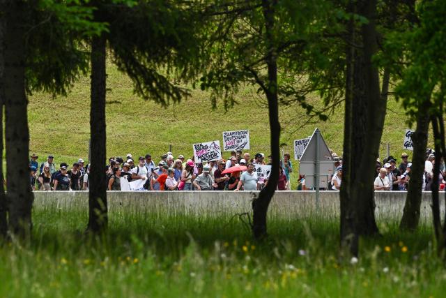 People take part in a demonstration against transit traffic near the A13 Brenner Highway in the direction of Italy on May 30, 2026, on the Tyrolean Brenner Highway. A protest in Austria on May 30 against noise and pollution is set to close one of Europe's most important highways connecting Germany and Italy, potentially causing major traffic disruptions.
Communities in Austria's western Tyrol province have long complained about traffic, especially trucks passing over the Brenner Pass and through the province. (Photo by Joe Klamar / AFP)