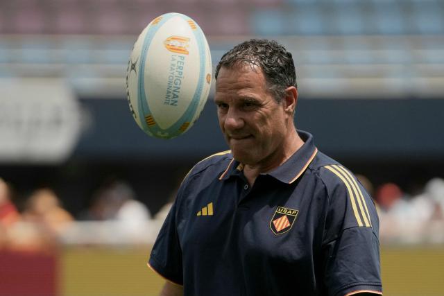 Perpignan's French head coach Laurent Labit eyes the ball ahead of the French Top14 rugby union match between USA Perpignan and Castres Olympique at the Aime-Giral stadium in Perpignan, south-western France on May 30, 2026. (Photo by Idriss Bigou-Gilles / AFP)