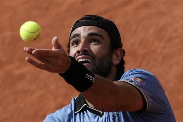 Italy's Matteo Berrettini serves to Argentina's Francisco Comesana during their men's singles match on day 7 of the French Open tennis tournament on Court Simonne-Mathieu at the Roland-Garros Complex in Paris on May 30, 2026. (Photo by Dimitar DILKOFF / AFP)