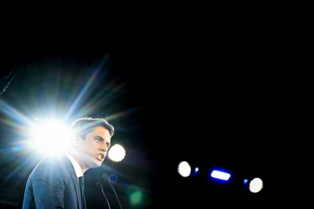 General Secretary of French centrist party Renaissance and candidate for France's 2027 Presidential election Gabriel Attal delivers a speech on stage during a political meeting, in Paris, on May 30, 2026. (Photo by LOU BENOIST / AFP)