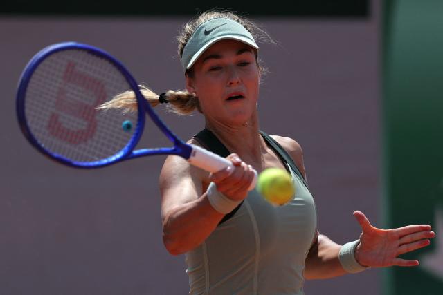 Anna Kalinskaya plays a forehand return to Colombia's Camila Osorio during their women's singles match on day 7 of the French Open tennis tournament at the Roland-Garros Complex in Paris on May 30, 2026. (Photo by Thomas SAMSON / AFP)