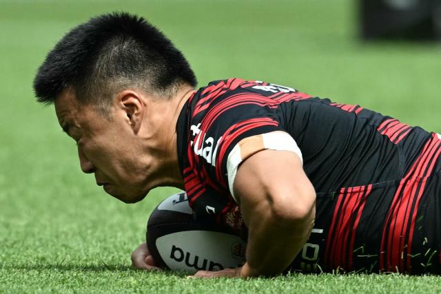 Toulouse’s Japanese scrum-half Naoto Saito scores a try during the French Top14 rugby union match between Stade Toulousain Rugby (Toulouse) and LOU rugby (Lyon) at the Ernest Wallon stadium in Toulouse, southwestern France on May 30, 2026. (Photo by Lionel BONAVENTURE / AFP)