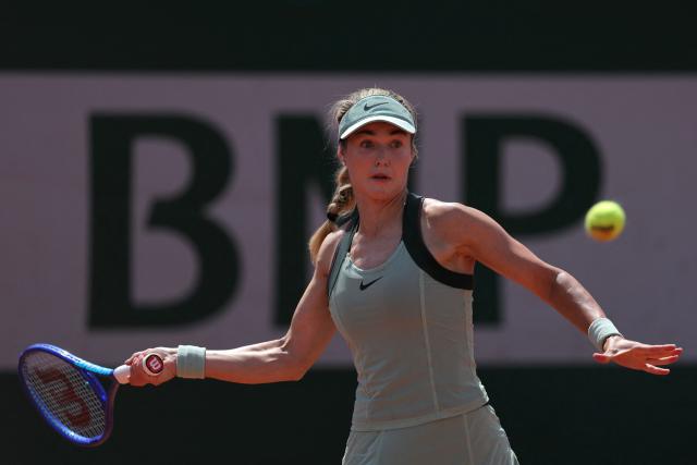 Anna Kalinskaya plays a forehand return to Colombia's Camila Osorio during their women's singles match on day 7 of the French Open tennis tournament at the Roland-Garros Complex in Paris on May 30, 2026. (Photo by Thomas SAMSON / AFP)