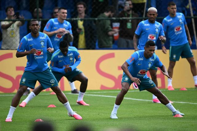 Brazil's forward Rayan and Brazil's defender Alexsandro stretch during a training session at the Granja Comary training center in Teresopolis, Rio de Janeiro, Brazil, on May 30, 2026. (Photo by Mauro PIMENTEL / AFP)