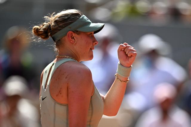 US Amanda Anisimova reacts after a point as she plays against France's Diane Parry during their women's singles match on day 7 of the French Open tennis tournament on Court Philippe-Chatrier at the Roland-Garros Complex in Paris on May 30, 2026. (Photo by JULIEN DE ROSA / AFP)